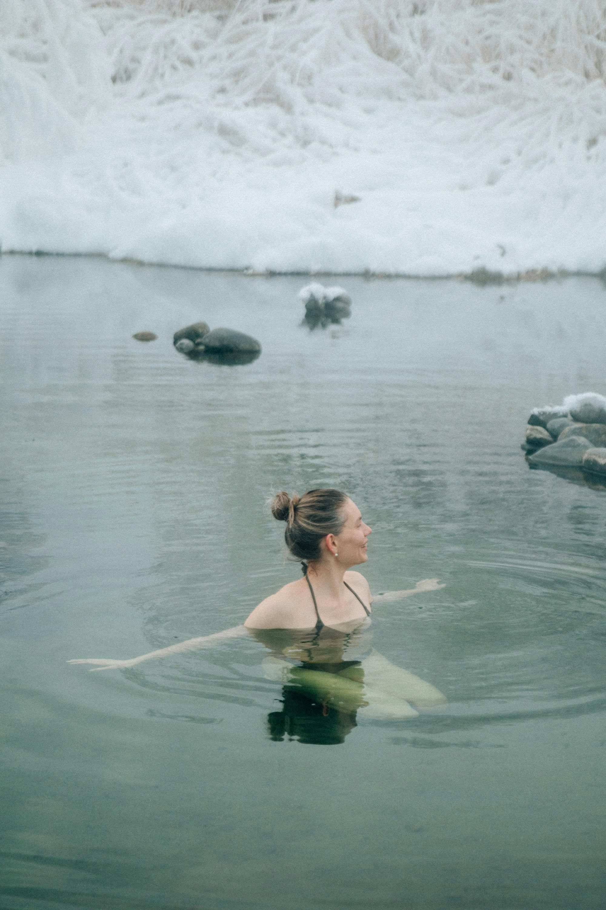 woman swimming in cold water